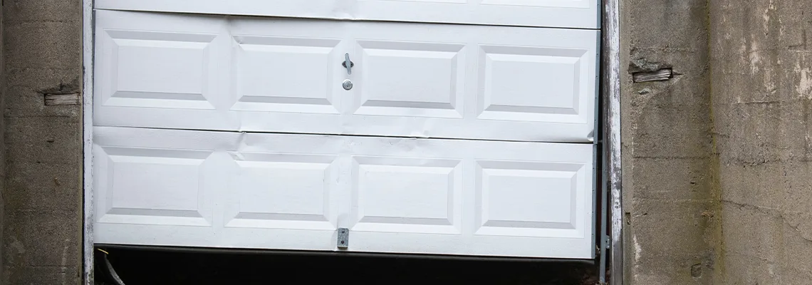 Garage Door Got Hit By A Car Dent Removal in Champaign, IL