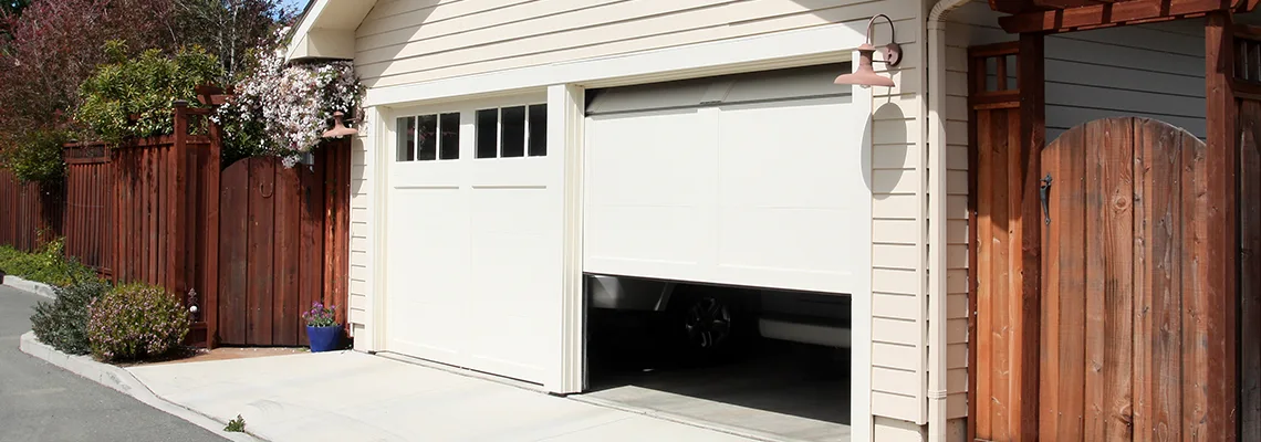 Fix Metal Garage Door Jerking in Champaign, Illinois